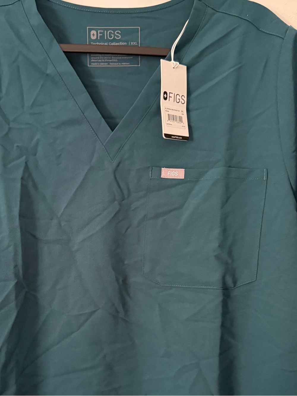 FIGS Women’s Teal V-Neck Scrub Top with Chest Pocket
